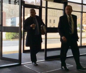 Tyson In Arrears on Paying Disciplinary Costs Accompanied by fellow Huntington attorney Scott Bellomy, left, David Tyson arrives at his March 2019 hearing before a Lawyer Disciplinary Board subcommittee to answer charges why he failed to timely repay a client's retainer.